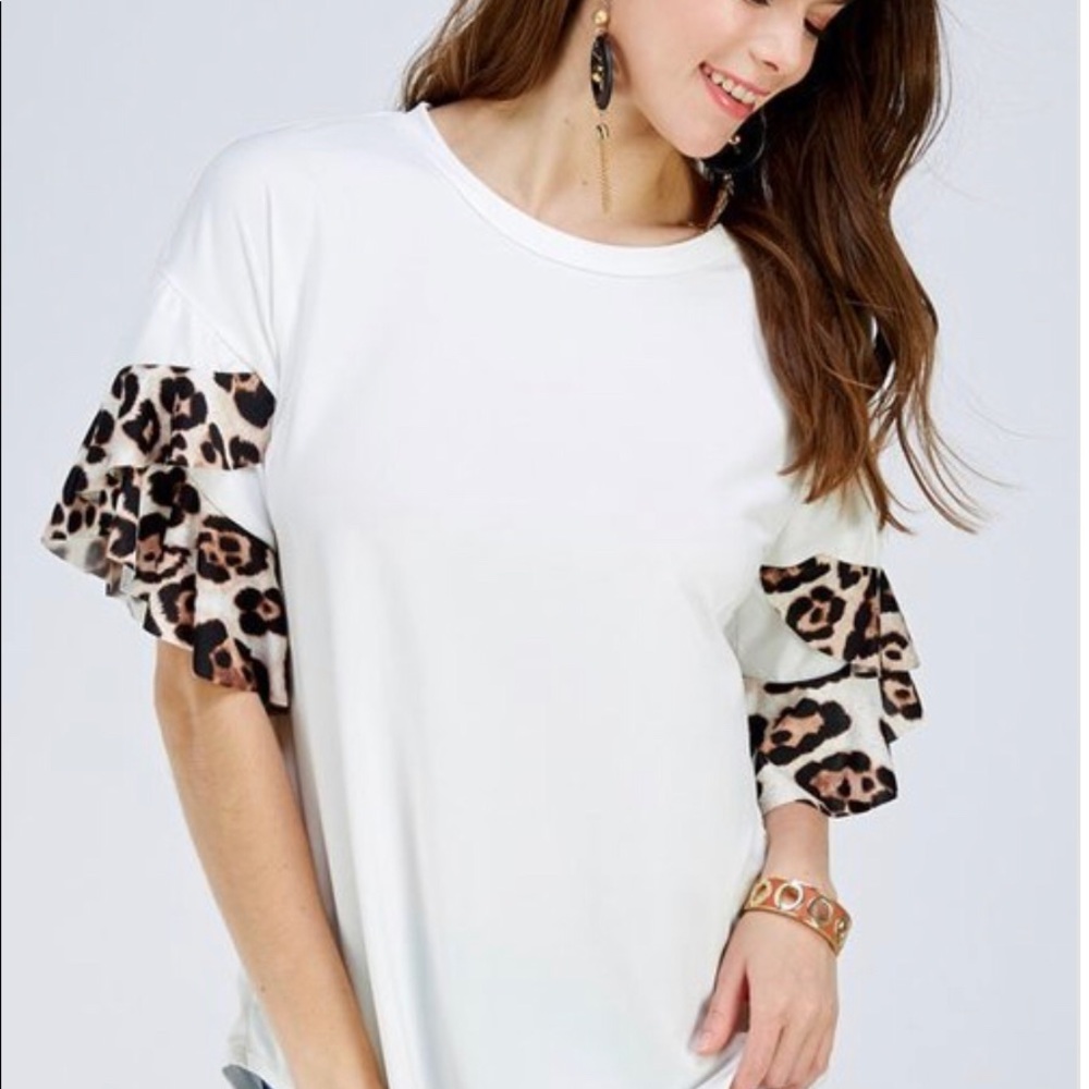 White knit top with animal print sleeves